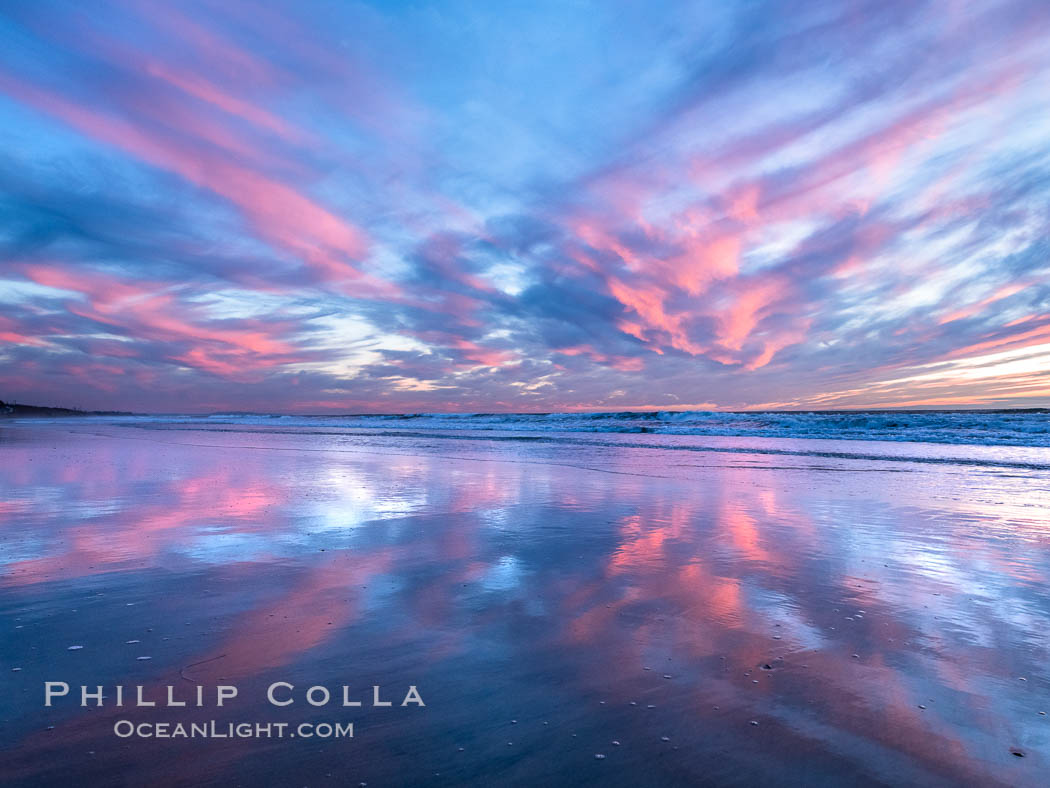 Spectacular Sunset, Terramar Beach, Carlsbad. Pink and Purple pastel hues are mirrored on the wet side as the tide retreats