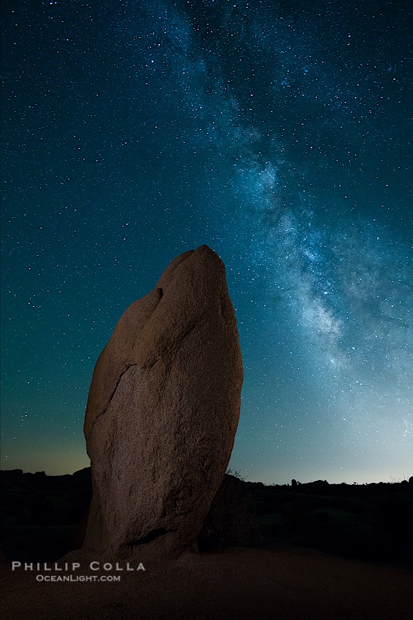 Standing stone and Milky Way, stars fill the night sky., natural history stock photograph, photo id 27801