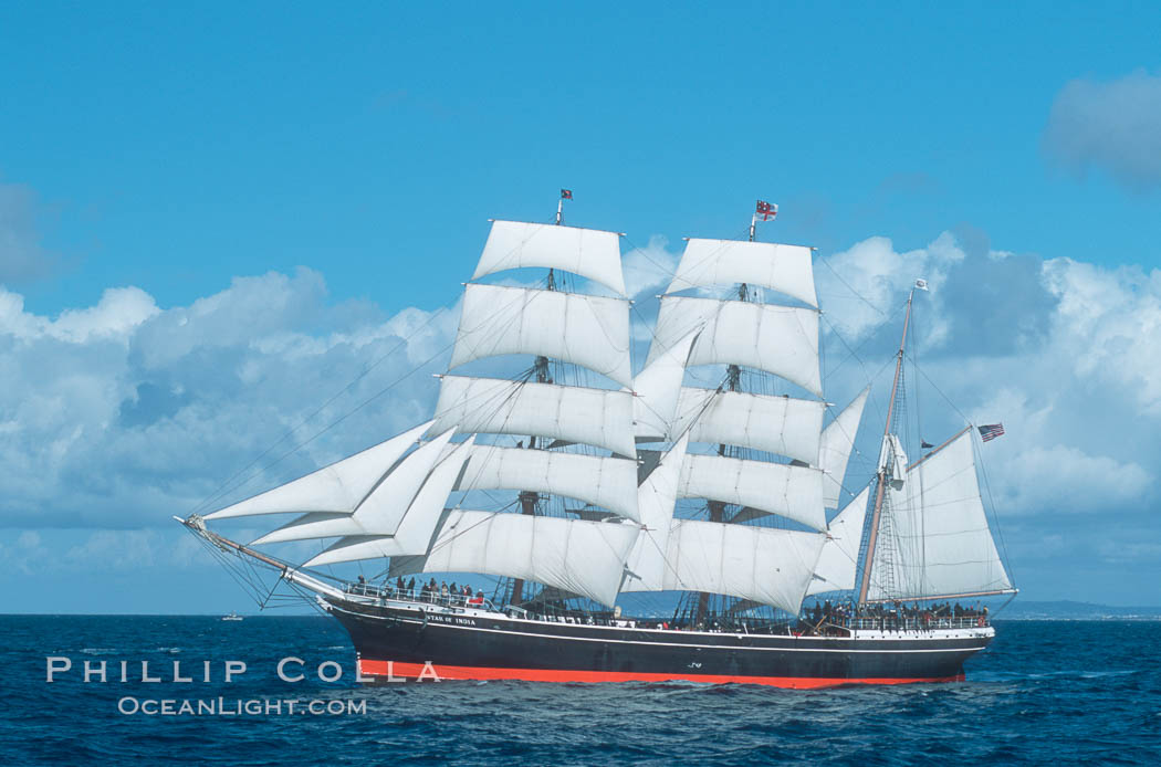 The Star of India under full sail offshore of San Diego. The Star of India is the worlds oldest seafaring ship.  Built in 1863, she is an experimental design of iron rather than wood.  She is now a maritime museum docked in San Diego Harbor, and occasionally puts to sea for special sailing events., natural history stock photograph, photo id 07782