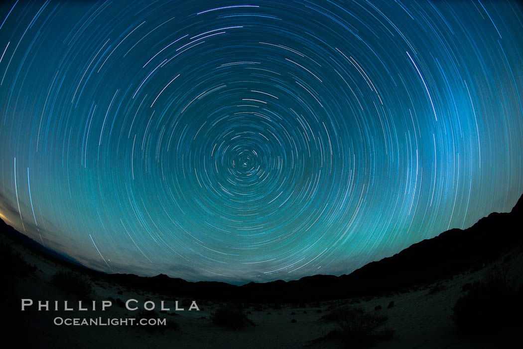 Star trails, rotating around the North Star (Polaris), seen from Death Valley. Milky Way Galaxy, The Universe, natural history stock photograph, photo id 25270