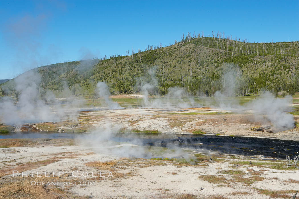 Steam rises above the Firehole River. Midway Geyser Basin, Yellowstone National Park, Wyoming, USA, natural history stock photograph, photo id 13607