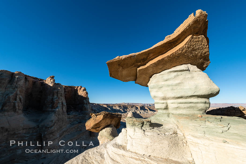 Pedestal rock, or hoodoo, at Stud Horse Point. These hoodoos form when erosion occurs around but not underneath a more resistant caprock that sits atop of the hoodoo spire. Stud Horse Point is a spectacular viewpoint on a mesa overlooking the Arizona / Utah border. Page, USA, natural history stock photograph, photo id 37778