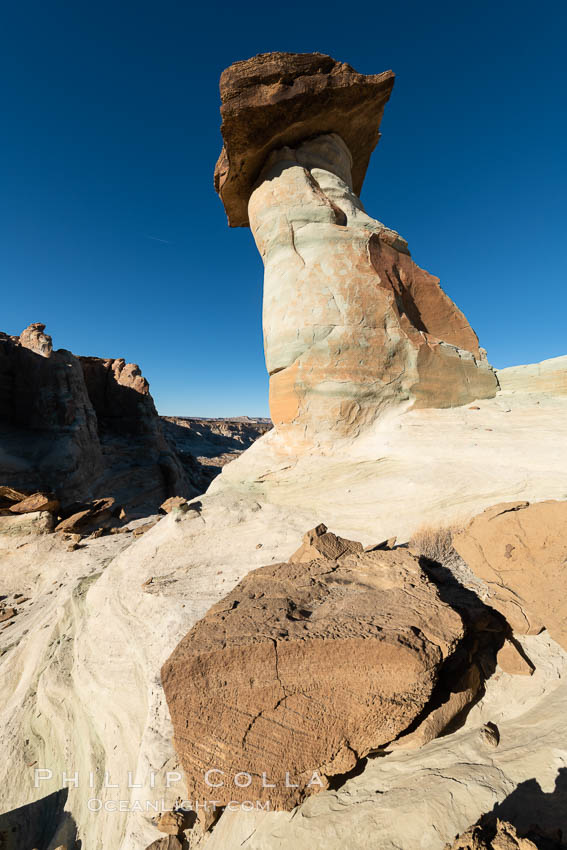 Pedestal rock, or hoodoo, at Stud Horse Point. These hoodoos form when erosion occurs around but not underneath a more resistant caprock that sits atop of the hoodoo spire. Stud Horse Point is a spectacular viewpoint on a mesa overlooking the Arizona / Utah border. Page, USA, natural history stock photograph, photo id 37780