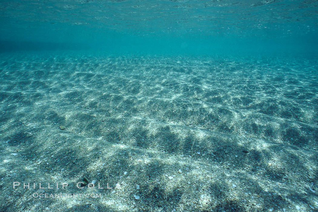 Sunlight spreads across broad sand plains, trochoidal patterns. Sea of Cortez, La Paz, Baja California, Mexico, natural history stock photograph, photo id 04770