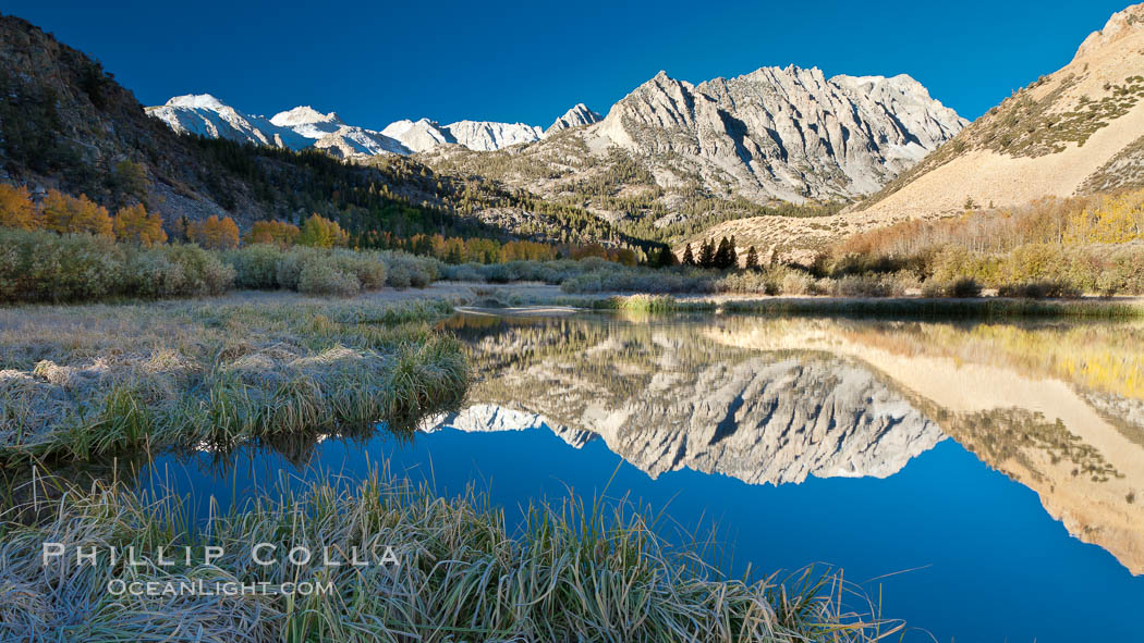Sunrise on Paiute Peak, reflected in North Lake in the eastern Sierra Nevada, in autumn. Bishop Creek Canyon Sierra Nevada Mountains, California, USA, natural history stock photograph, photo id 26055