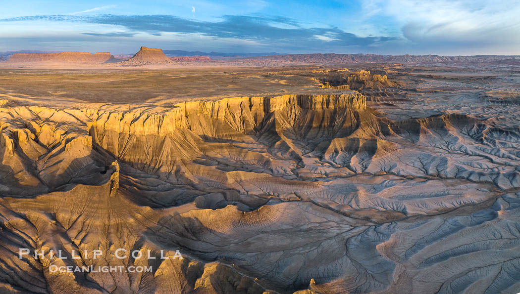 Sunrise over the Skyline Rim, Factory Bench and Lower Blue Hills, Utah. Factory Butte is in the distance. USA, natural history stock photograph, photo id 38200