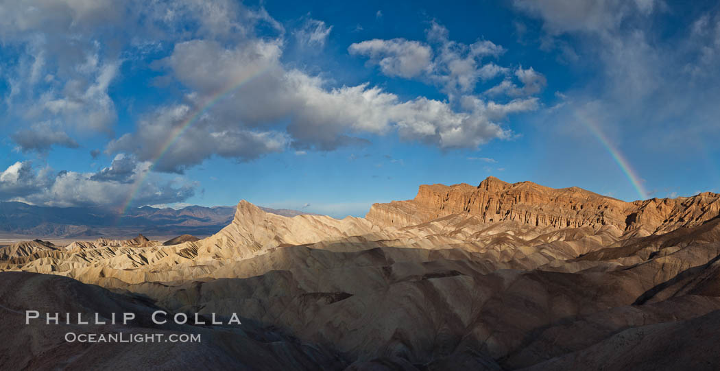 Sunrise at Zabriskie Point, Manly Beacon is lit by the morning sun while clouds from a clearing storm pass by. Death Valley National Park, California, USA, natural history stock photograph, photo id 27662