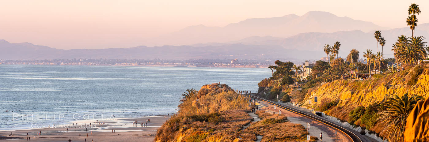 Sunset on the Del Mar Bluffs and Train Tracks, with North County coastline. The highest peaks in the distance are Santiago Peak and Modjeska Peak, the pair commonly known as Saddleback. California, USA, natural history stock photograph, photo id 37603