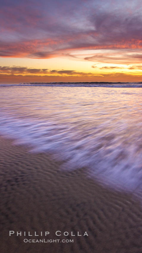Sunset and incoming surf, gorgeous colors in the sky and on the ocean at dusk, the incoming waves are blurred in this long exposure. Carlsbad, California, USA, natural history stock photograph, photo id 27154