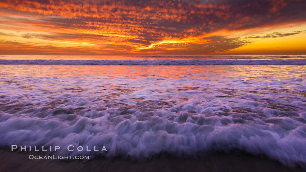 Sunset and incoming surf, gorgeous colors in the sky and on the ocean at dusk, the incoming waves are blurred in this long exposure. Carlsbad, California, USA, natural history stock photograph, photo id 27158