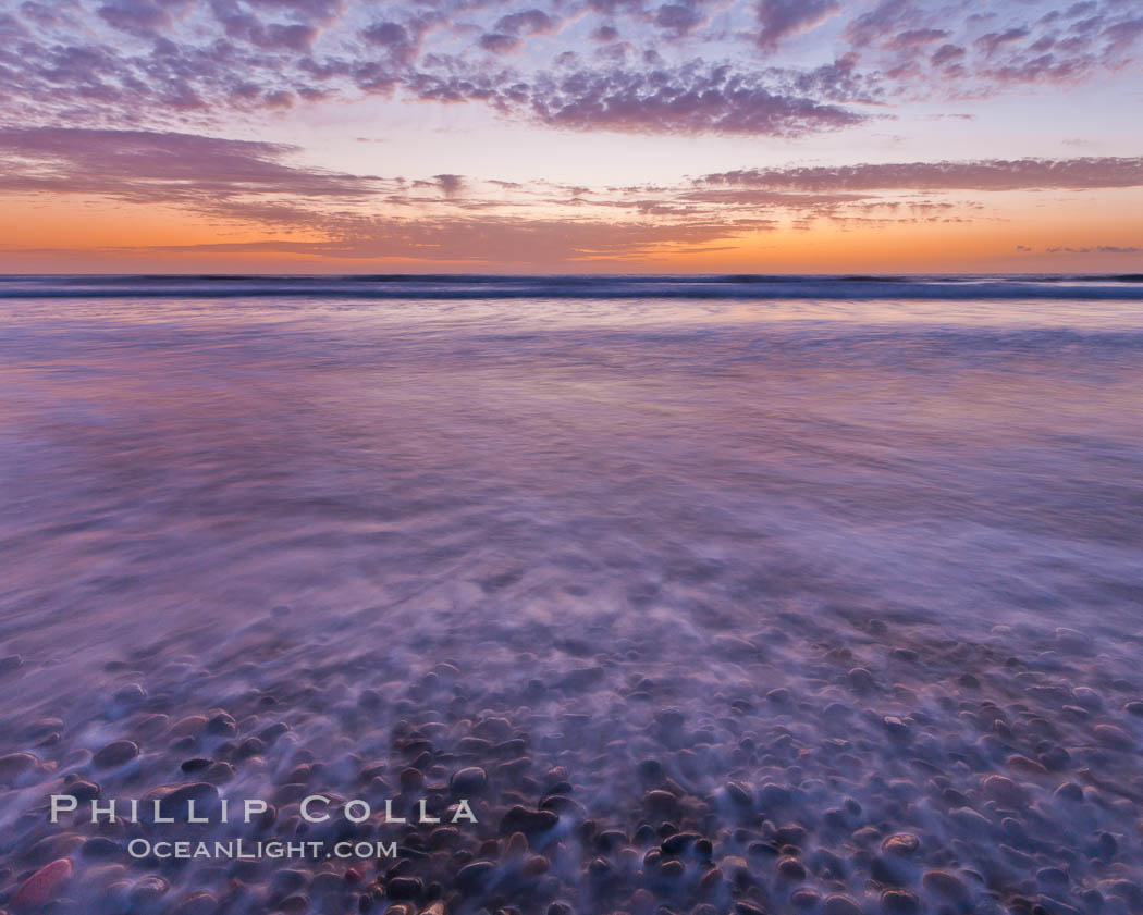 Sunset and incoming surf, gorgeous colors in the sky and on the ocean at dusk, the incoming waves are blurred in this long exposure. Carlsbad, California, USA, natural history stock photograph, photo id 27182