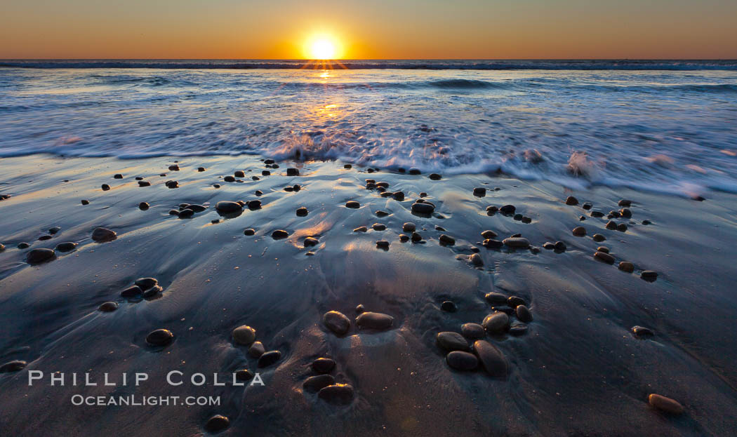 Sunset and incoming surf, gorgeous colors in the sky and on the ocean at dusk, the incoming waves are blurred in this long exposure. Carlsbad, California, USA, natural history stock photograph, photo id 27186