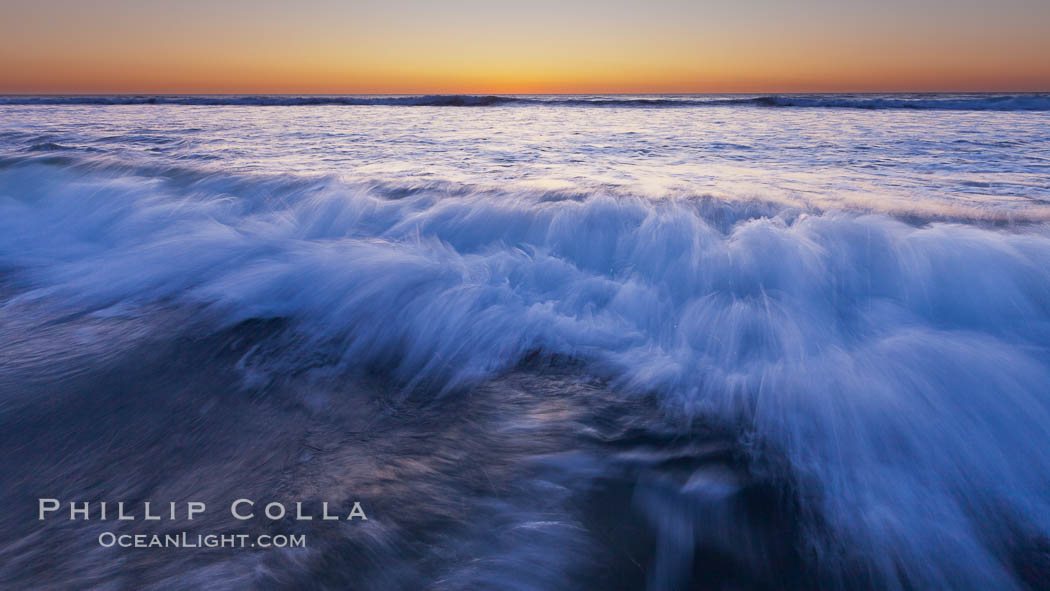 Sunset and incoming surf, gorgeous colors in the sky and on the ocean at dusk, the incoming waves are blurred in this long exposure. Carlsbad, California, USA, natural history stock photograph, photo id 27190