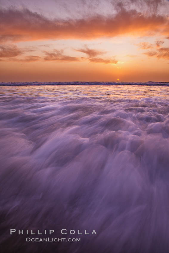 Sunset and incoming surf, gorgeous colors in the sky and on the ocean at dusk, the incoming waves are blurred in this long exposure. Carlsbad, California, USA, natural history stock photograph, photo id 27164