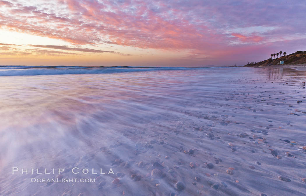 Sunset and incoming surf, gorgeous colors in the sky and on the ocean at dusk, the incoming waves are blurred in this long exposure. Carlsbad, California, USA, natural history stock photograph, photo id 27180