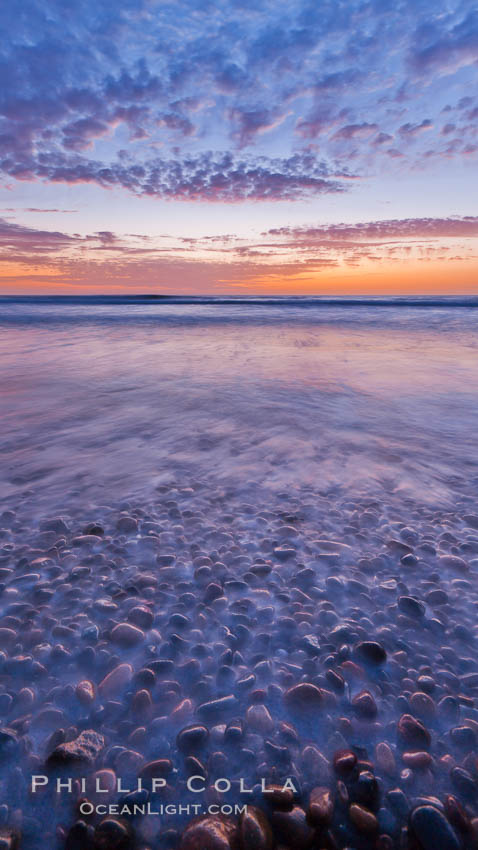 Sunset and incoming surf, gorgeous colors in the sky and on the ocean at dusk, the incoming waves are blurred in this long exposure. Carlsbad, California, USA, natural history stock photograph, photo id 27184
