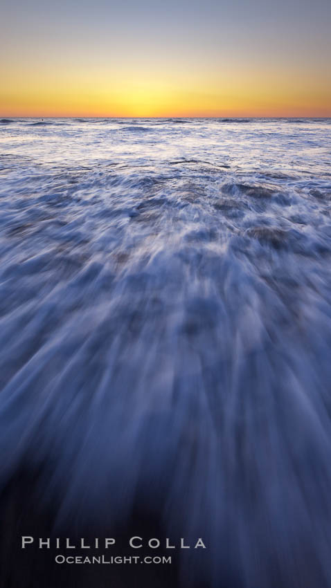 Sunset and incoming surf, gorgeous colors in the sky and on the ocean at dusk, the incoming waves are blurred in this long exposure. Carlsbad, California, USA, natural history stock photograph, photo id 27188