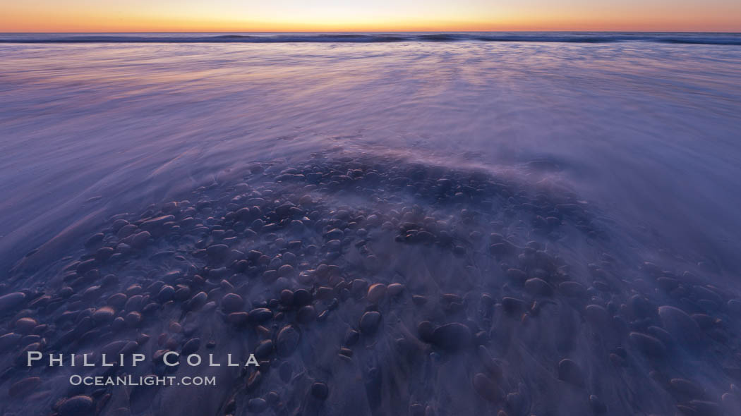 Sunset and incoming surf, gorgeous colors in the sky and on the ocean at dusk, the incoming waves are blurred in this long exposure. Carlsbad, California, USA, natural history stock photograph, photo id 27192