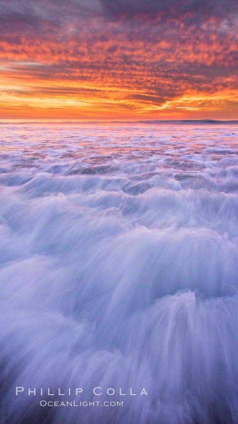 Sunset and incoming surf, gorgeous colors in the sky and on the ocean at dusk, the incoming waves are blurred in this long exposure. Carlsbad, California, USA, natural history stock photograph, photo id 27159