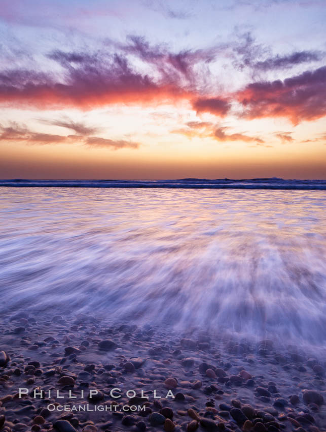 Sunset and incoming surf, gorgeous colors in the sky and on the ocean at dusk, the incoming waves are blurred in this long exposure. Carlsbad, California, USA, natural history stock photograph, photo id 27167