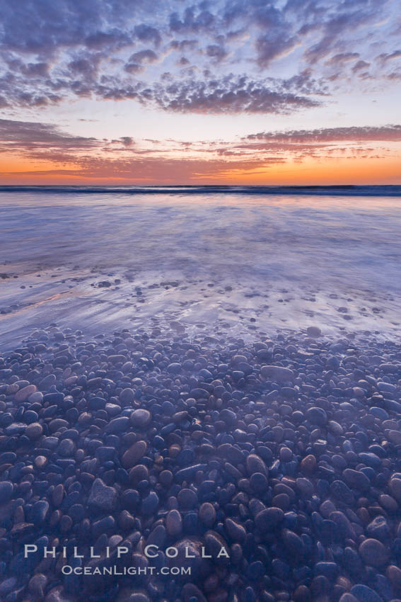 Sunset and incoming surf, gorgeous colors in the sky and on the ocean at dusk, the incoming waves are blurred in this long exposure. Carlsbad, California, USA, natural history stock photograph, photo id 27183
