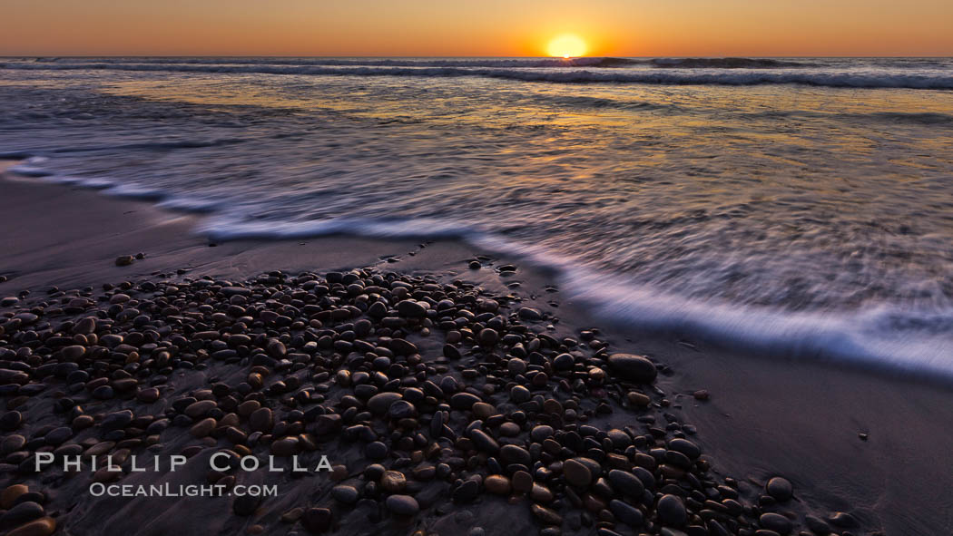 Sunset and incoming surf, gorgeous colors in the sky and on the ocean at dusk, the incoming waves are blurred in this long exposure. Carlsbad, California, USA, natural history stock photograph, photo id 27187