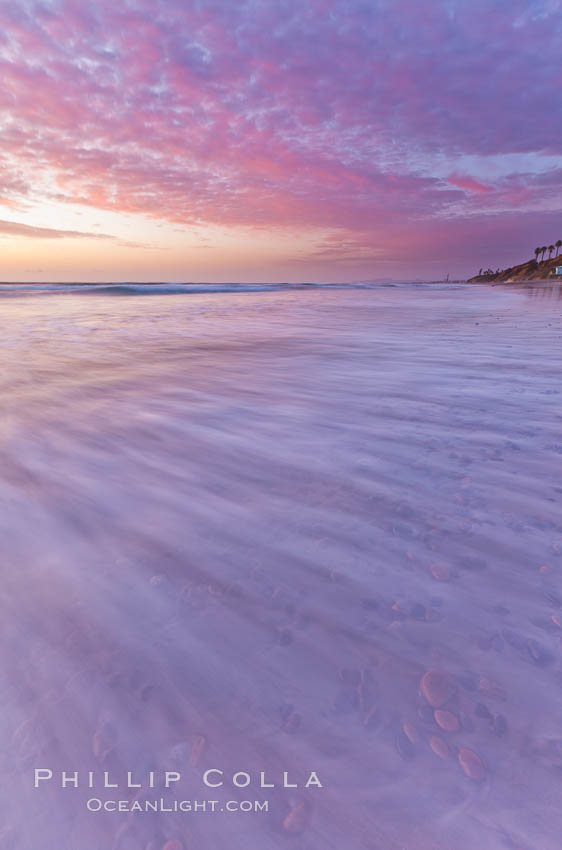 Sunset and incoming surf, gorgeous colors in the sky and on the ocean at dusk, the incoming waves are blurred in this long exposure. Carlsbad, California, USA, natural history stock photograph, photo id 27181
