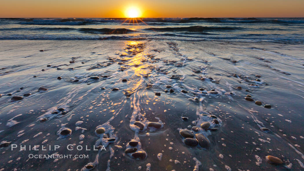 Sunset and incoming surf, gorgeous colors in the sky and on the ocean at dusk, the incoming waves are blurred in this long exposure. Carlsbad, California, USA, natural history stock photograph, photo id 27185