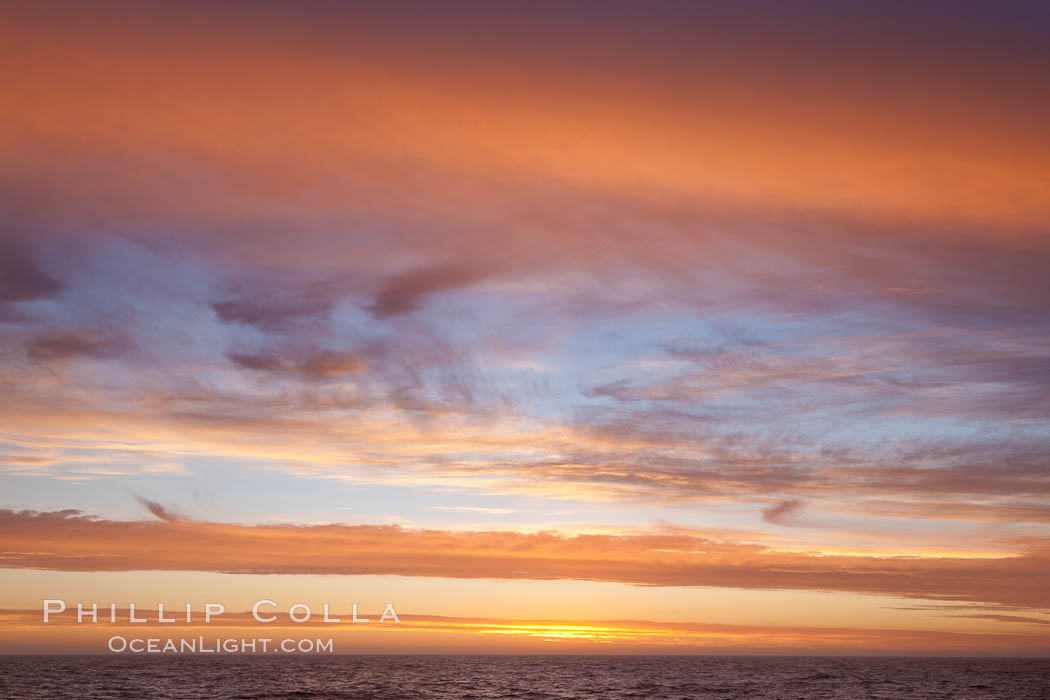 Sunset, dusk clouds, detail in the sky over the open sea, somewhere between Falkland Islands and South Georgia Island. Southern Ocean, natural history stock photograph, photo id 24184