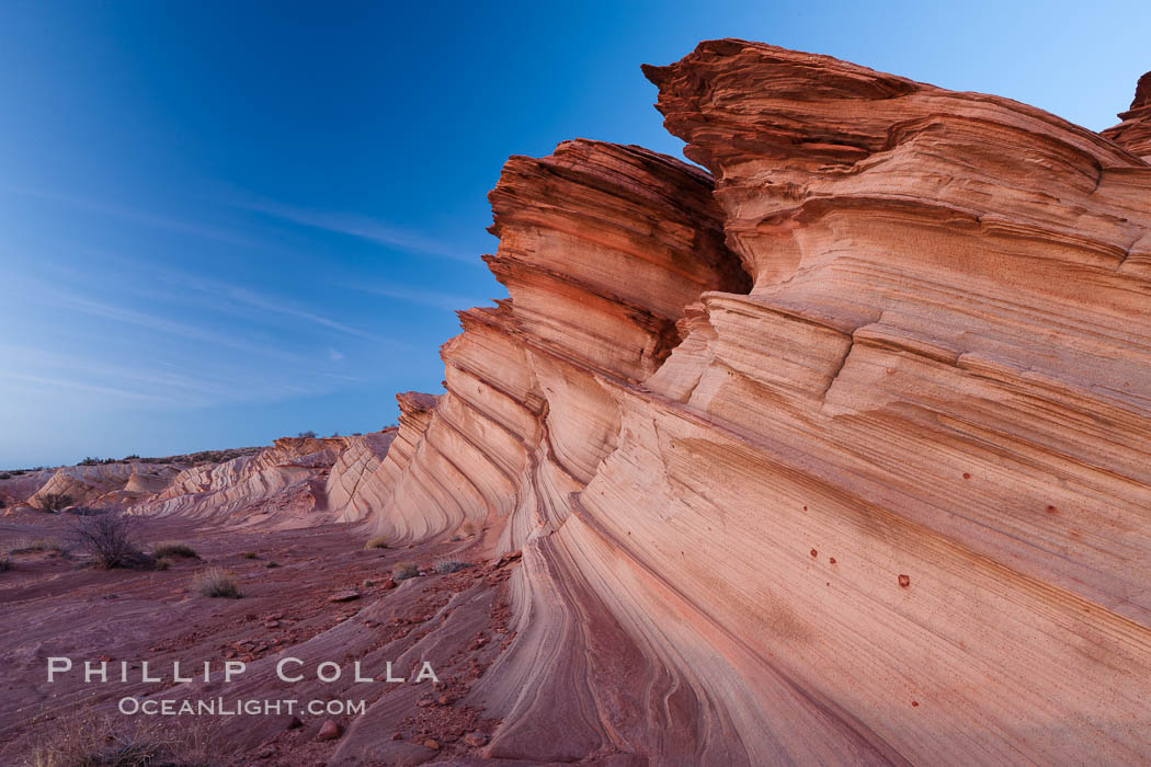 Sandstone "fins", eroded striations that depict how sandstone -- ancient compressed sand -- was laid down in layers over time.  Now exposed, the layer erode at different rates, forming delicate "fins" that stretch for long distances. Navajo Tribal Lands, Page, Arizona, USA, natural history stock photograph, photo id 26676