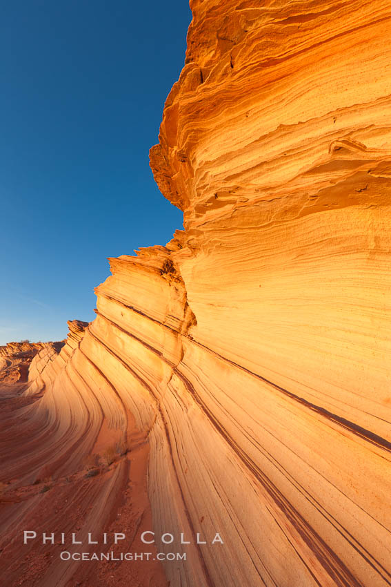 Sandstone "fins", eroded striations that depict how sandstone -- ancient compressed sand -- was laid down in layers over time.  Now exposed, the layer erode at different rates, forming delicate "fins" that stretch for long distances. Navajo Tribal Lands, Page, Arizona, USA, natural history stock photograph, photo id 26679