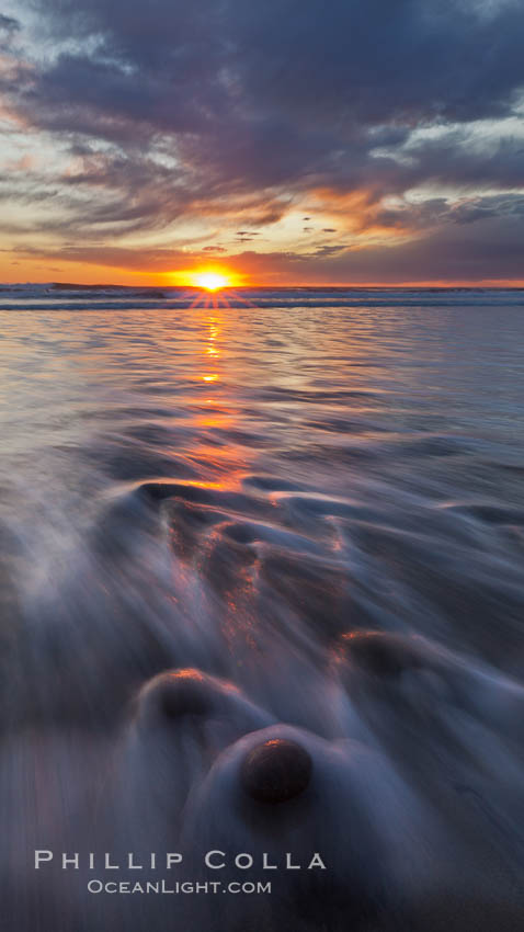 Surf and sky at sunset, waves crash upon the sand at dusk. Carlsbad, California, USA, natural history stock photograph, photo id 27238