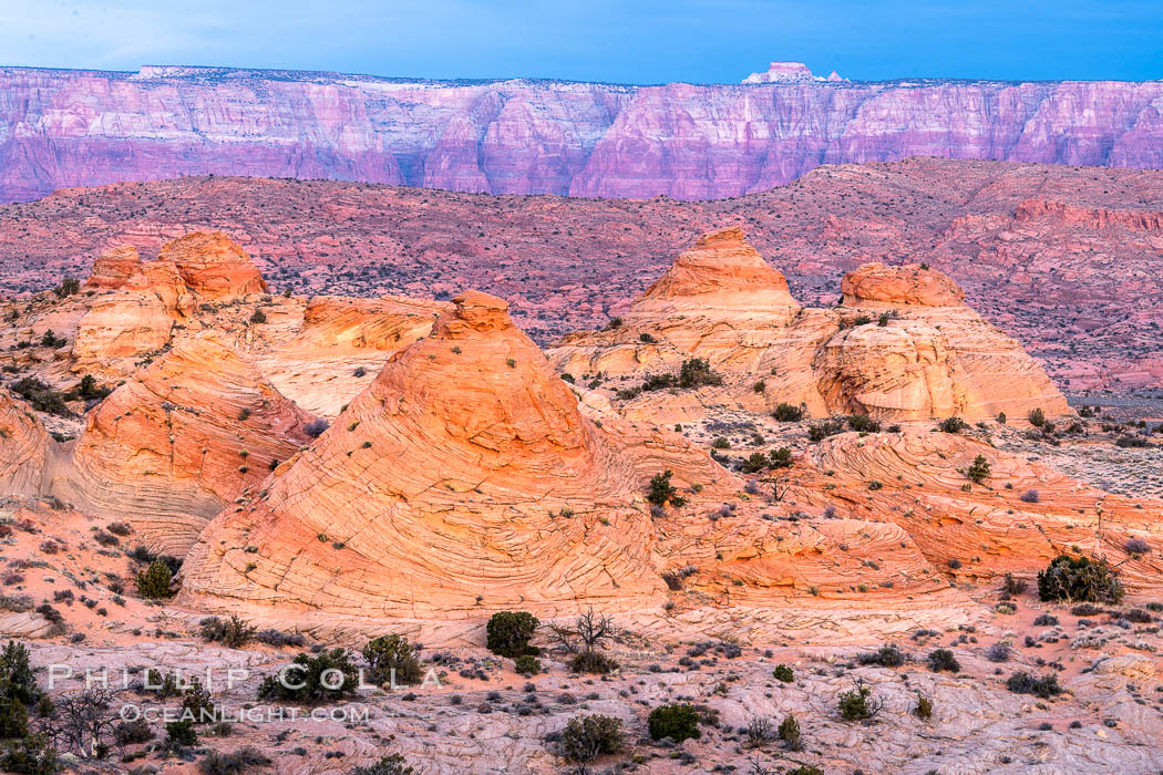 Teepee rocks at sunrise with the Vermillion Cliffs in the distance. Page, Arizona, USA, natural history stock photograph, photo id 36025