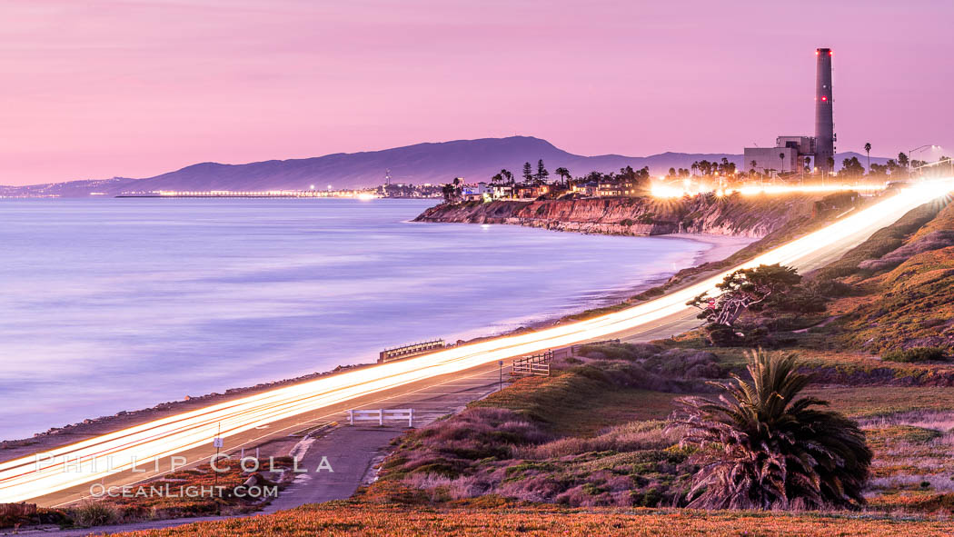 Sunset on Terra Mar and the Carlsbad coastline, looking north to Oceanside, Camp Pendleton and San Onofre.  The Oceanside Pier, lit up at night, is seen further up the coast. Rising in the distance is San Onofre Mountain (1722') topped by a tall signal tower, one of the southern peaks in the Santa Ana Mountains., natural history stock photograph, photo id 36117