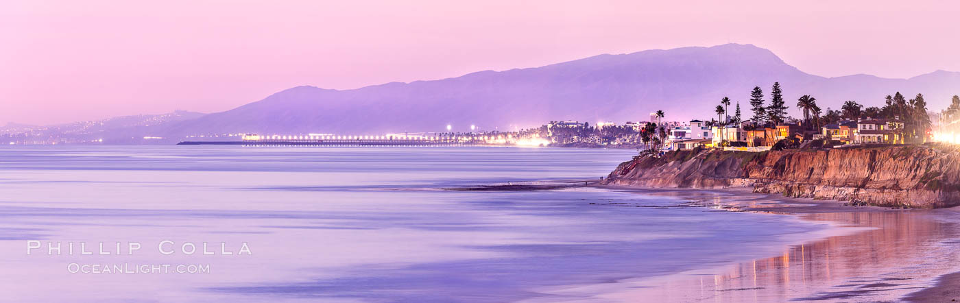 Carlsbad Coast at Sunset, Terramar and the Oceanside Pier, with Camp Pendleton and the San Onofre power plant in the distance on this incredibly clean and crisp evening view.  Rising in the distance is San Onofre Mountain (1722') topped by a tall signal tower, one of the southern peaks in the Santa Ana Mountains. California, USA, natural history stock photograph, photo id 37482