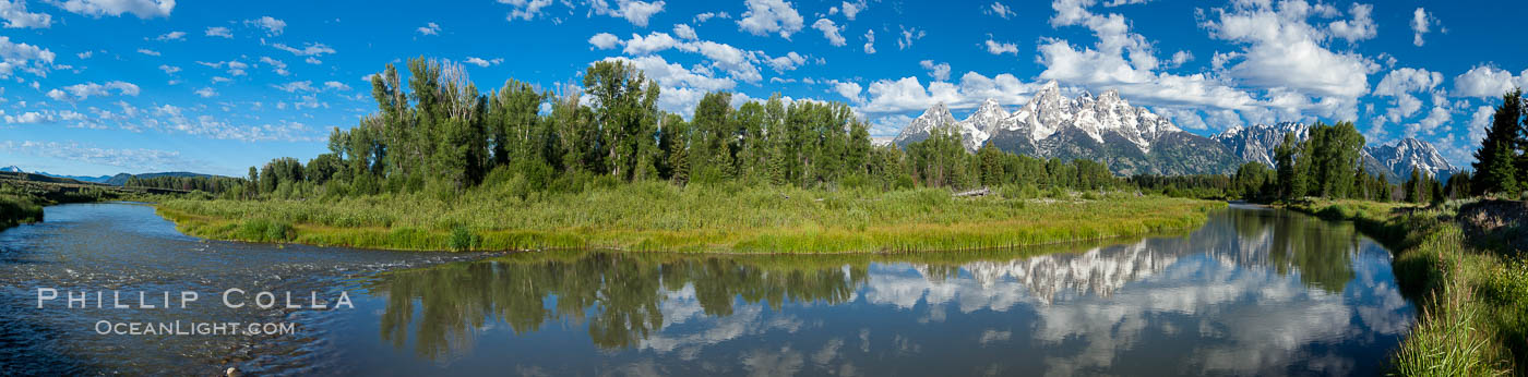 Panoramic photo of the Teton Range, reflected in the still waters of Schwabacher Landing, a sidewater of the Snake River. Grand Teton National Park, Wyoming, USA, natural history stock photograph, photo id 26921
