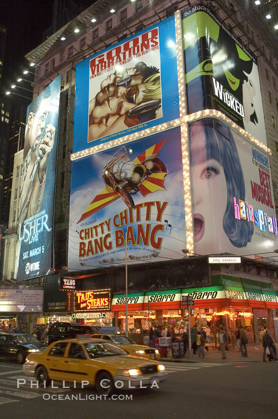 Neon lights fill Times Square at night. New York City, USA, natural history stock photograph, photo id 11207