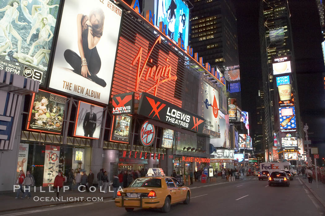 Neon lights fill Times Square at night. New York City, USA, natural history stock photograph, photo id 11201