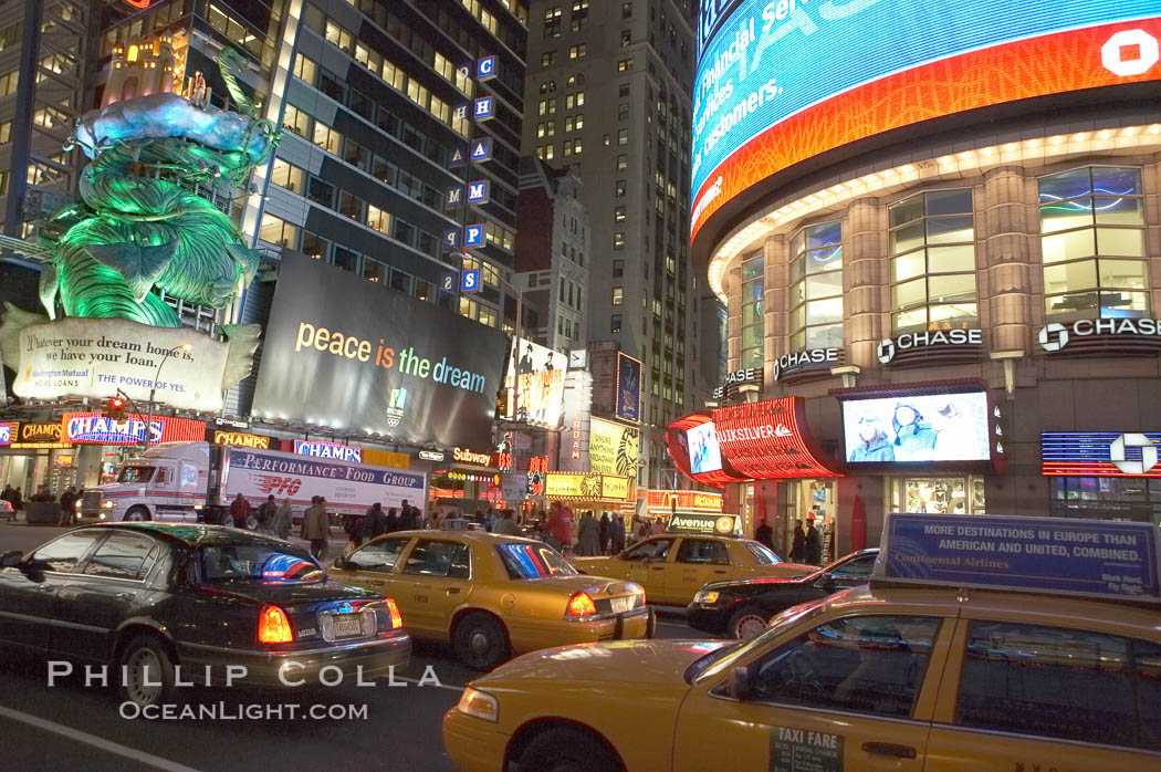 Neon lights fill Times Square at night. New York City, USA, natural history stock photograph, photo id 11205