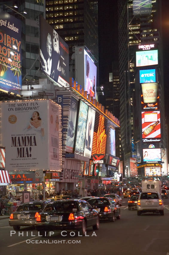 Neon lights fill Times Square at night. New York City, USA, natural history stock photograph, photo id 11213