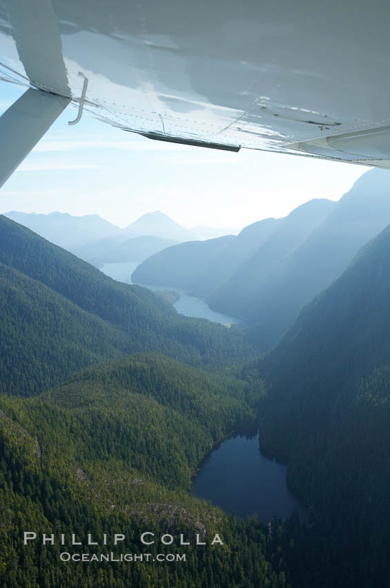 Shelter Inlet of Clayoquot Sound (distance) and small lake (foreground), amid the coastal mountains of western Vancouver Island, aerial photo. Megin Lake, British Columbia, Canada, natural history stock photograph, photo id 21118