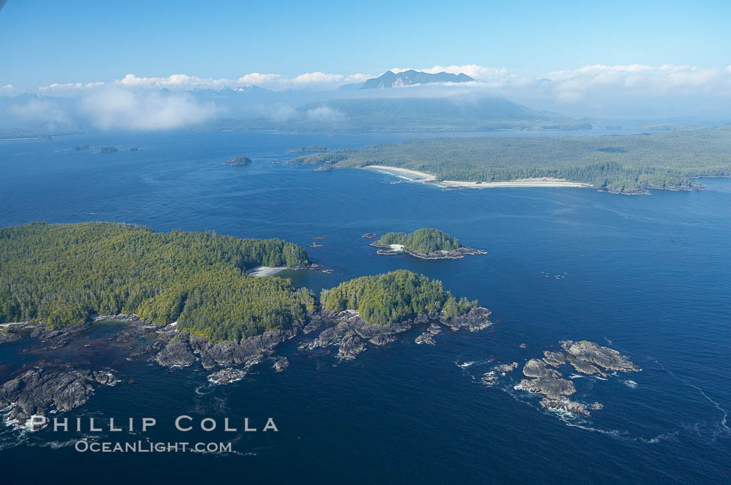Blunden Island (foreground) and Vargas Island (distance), surrounded by the waters of Clayoquot Sound, west coast of Vancouver Island. Tofino, British Columbia, Canada, natural history stock photograph, photo id 21069