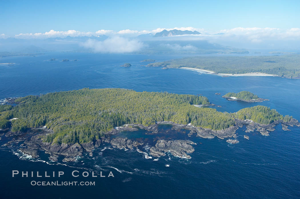 Blunden Island (foreground) and Vargas Island (distance), surrounded by the waters of Clayoquot Sound, west coast of Vancouver Island. Tofino, British Columbia, Canada, natural history stock photograph, photo id 21113