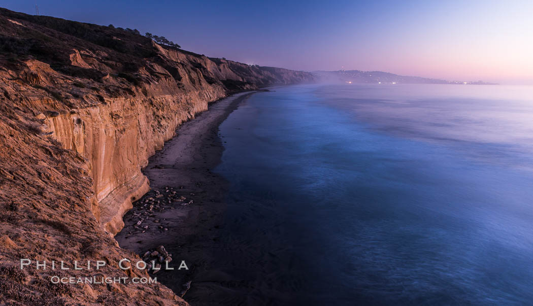 Seacliffs, La Jolla and evening lights, dusk, Pacific Ocean surf. California, USA, natural history stock photograph, photo id 28988
