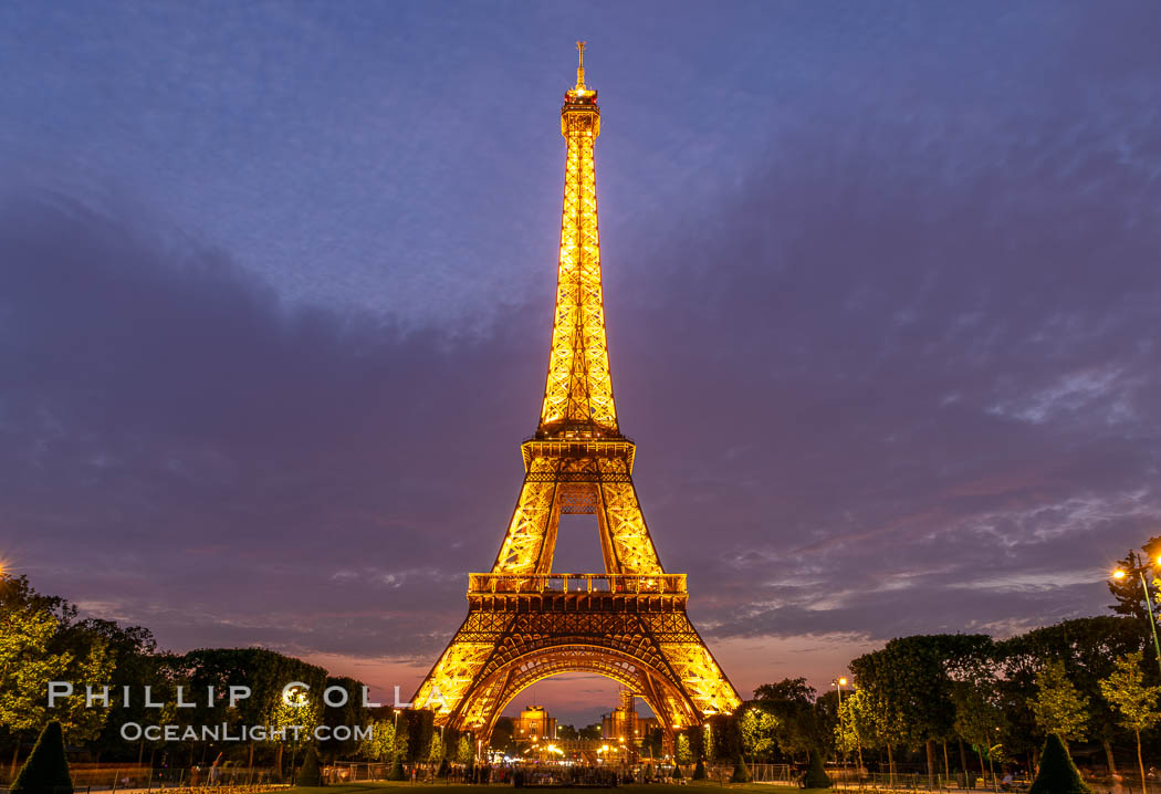 La Tour Eiffel. The Eiffel Tower is an iron lattice tower located on the Champ de Mars in Paris, named after the engineer Gustave Eiffel, who designed the tower in 1889 as the entrance arch to the 1889 World's Fair. The Eiffel tower is the tallest structure in Paris and the most-visited paid monument in the world. France, natural history stock photograph, photo id 35718