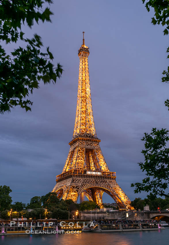 La Tour Eiffel. The Eiffel Tower is an iron lattice tower located on the Champ de Mars in Paris, named after the engineer Gustave Eiffel, who designed the tower in 1889 as the entrance arch to the 1889 World's Fair. The Eiffel tower is the tallest structure in Paris and the most-visited paid monument in the world. France, natural history stock photograph, photo id 35676