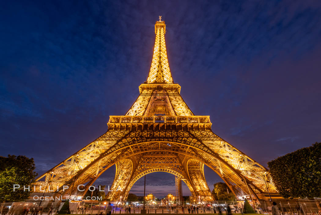 La Tour Eiffel. The Eiffel Tower is an iron lattice tower located on the Champ de Mars in Paris, named after the engineer Gustave Eiffel, who designed the tower in 1889 as the entrance arch to the 1889 World's Fair. The Eiffel tower is the tallest structure in Paris and the most-visited paid monument in the world. France, natural history stock photograph, photo id 35717