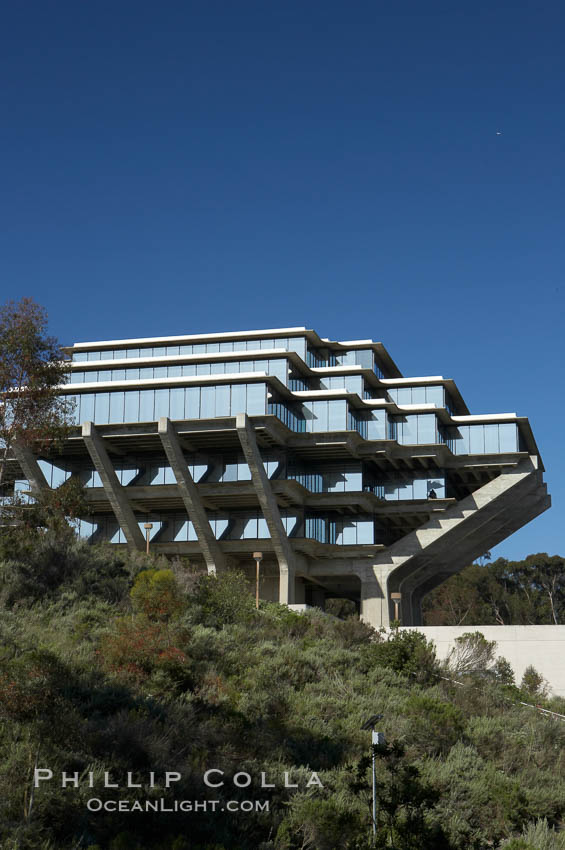 The UCSD Library (Geisel Library, UCSD Central Library) at the University of California, San Diego.  UCSD Library.  La Jolla, California.  On December 1, 1995 The University Library Building was renamed Geisel Library in honor of Audrey and Theodor Geisel (Dr. Seuss) for the generous contributions they have made to the library and their devotion to improving literacy.  In The Tower, Floors 4 through 8 house much of the Librarys collection and study space, while Floors 1 and 2 house service desks and staff work areas.  The library, designed in the late 1960s by William Pereira, is an eight story, concrete structure sited at the head of a canyon near the center of the campus. The lower two stories form a pedestal for the six story, stepped tower that has become a visual symbol for UCSD. USA, natural history stock photograph, photo id 11282