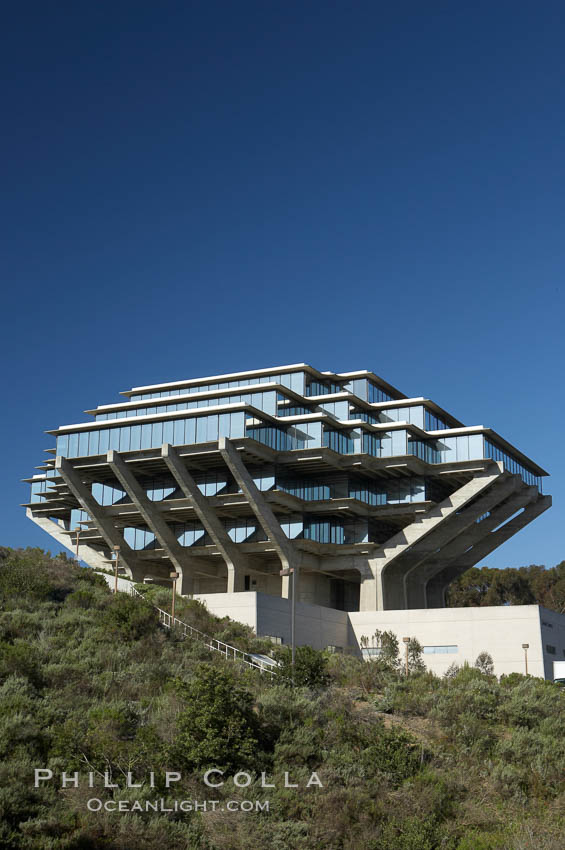 The UCSD Library (Geisel Library, UCSD Central Library) at the University of California, San Diego.  UCSD Library.  La Jolla, California.  On December 1, 1995 The University Library Building was renamed Geisel Library in honor of Audrey and Theodor Geisel (Dr. Seuss) for the generous contributions they have made to the library and their devotion to improving literacy.  In The Tower, Floors 4 through 8 house much of the Librarys collection and study space, while Floors 1 and 2 house service desks and staff work areas.  The library, designed in the late 1960s by William Pereira, is an eight story, concrete structure sited at the head of a canyon near the center of the campus. The lower two stories form a pedestal for the six story, stepped tower that has become a visual symbol for UCSD. USA, natural history stock photograph, photo id 11276