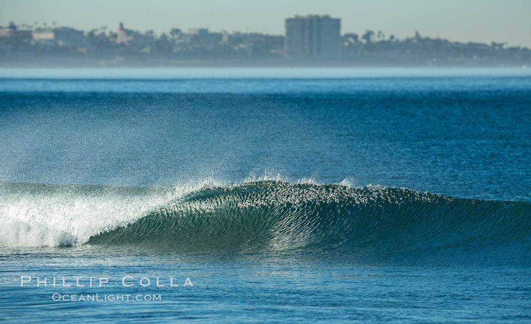 Unridden wave at Torrey Pines, La Jolla in the distance., natural history stock photograph, photo id 30274